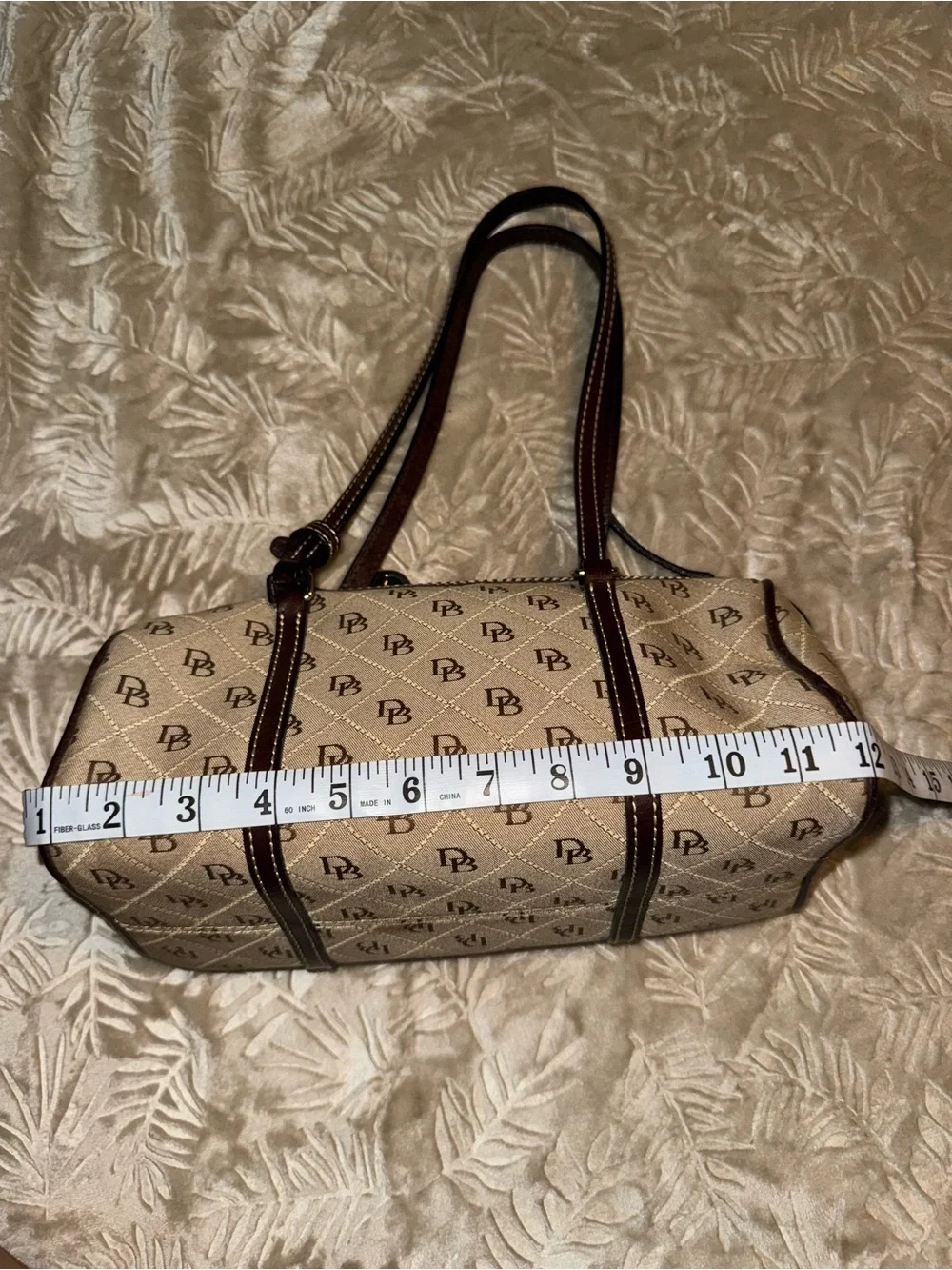Dooney & Bourke Beige Logo Quilted Barrel Shoulder Bag with Brown Trim